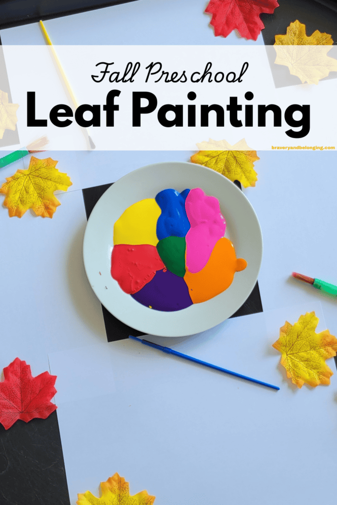 Pin text reads, fall preschool leaf painting and shows an image of a plate with different colored paint on it and some fall leaves and paintbrushes scattered onto paper ready for painting.
